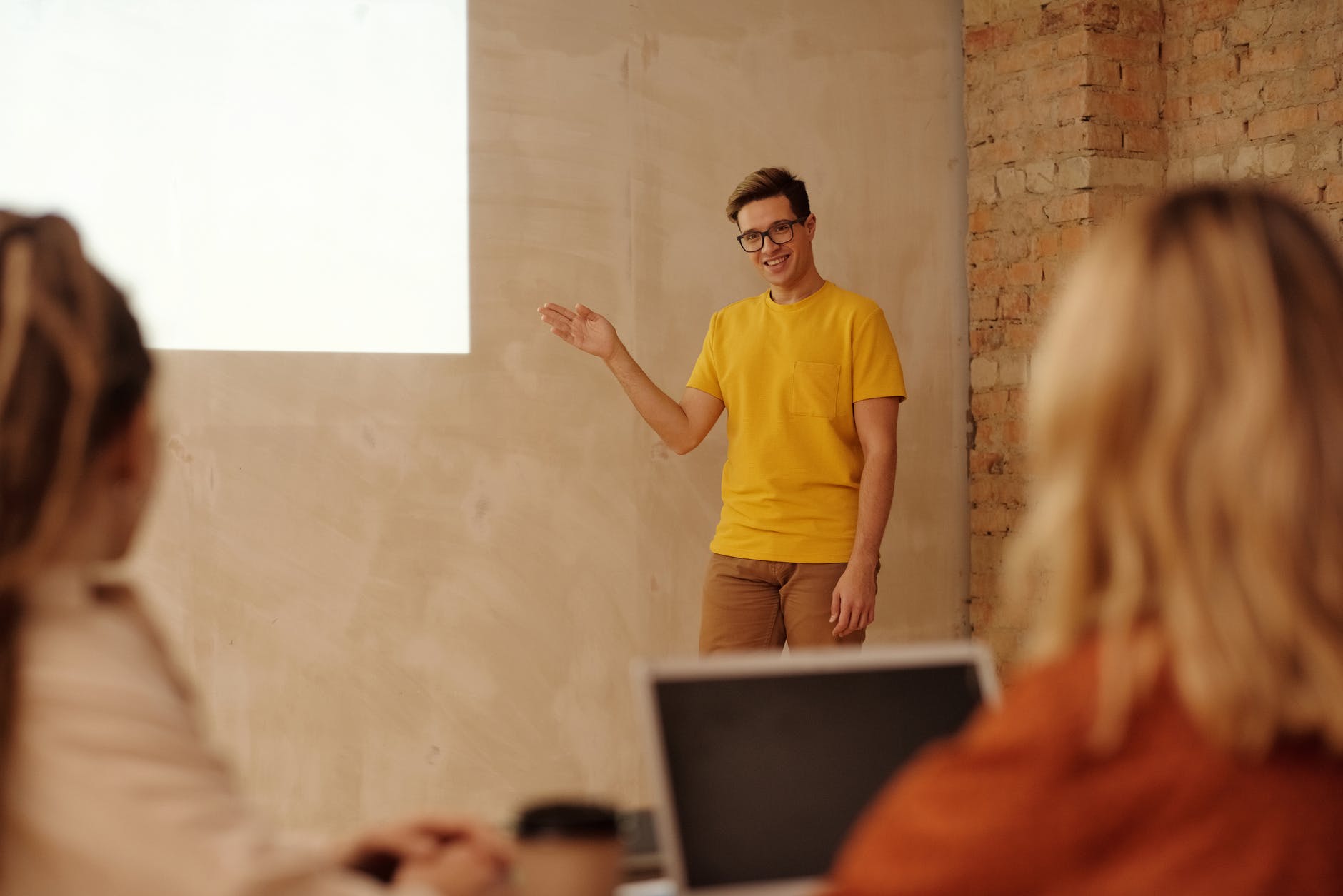 a man in yellow shirt